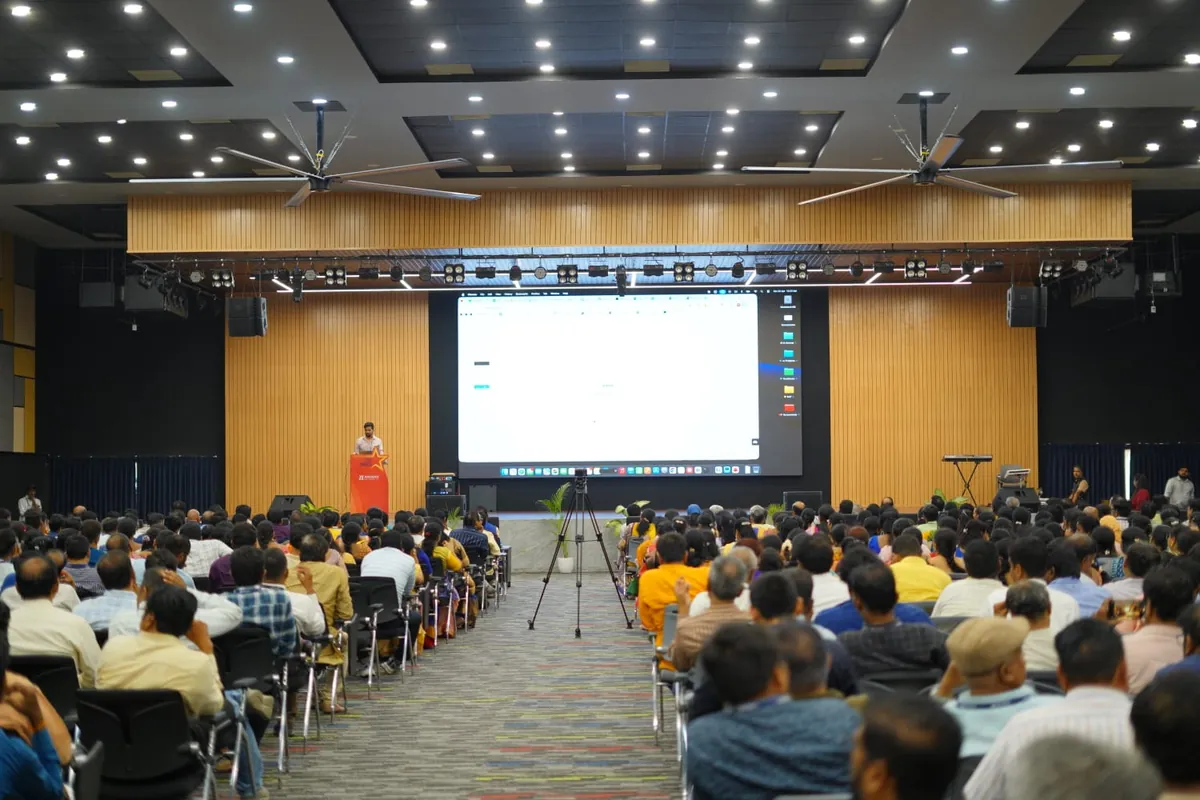 Rajeev Pandey addressing a full university auditorium